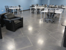 Stained concrete floors with an abstract geometric pattern in a Las Vegas office.